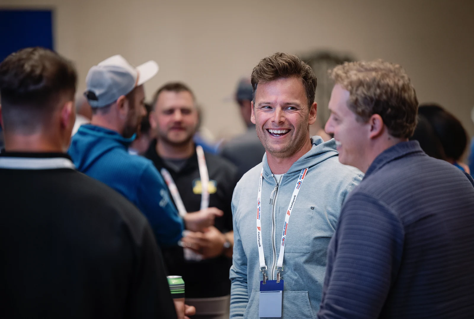 HSF members talking and laughing at a member event